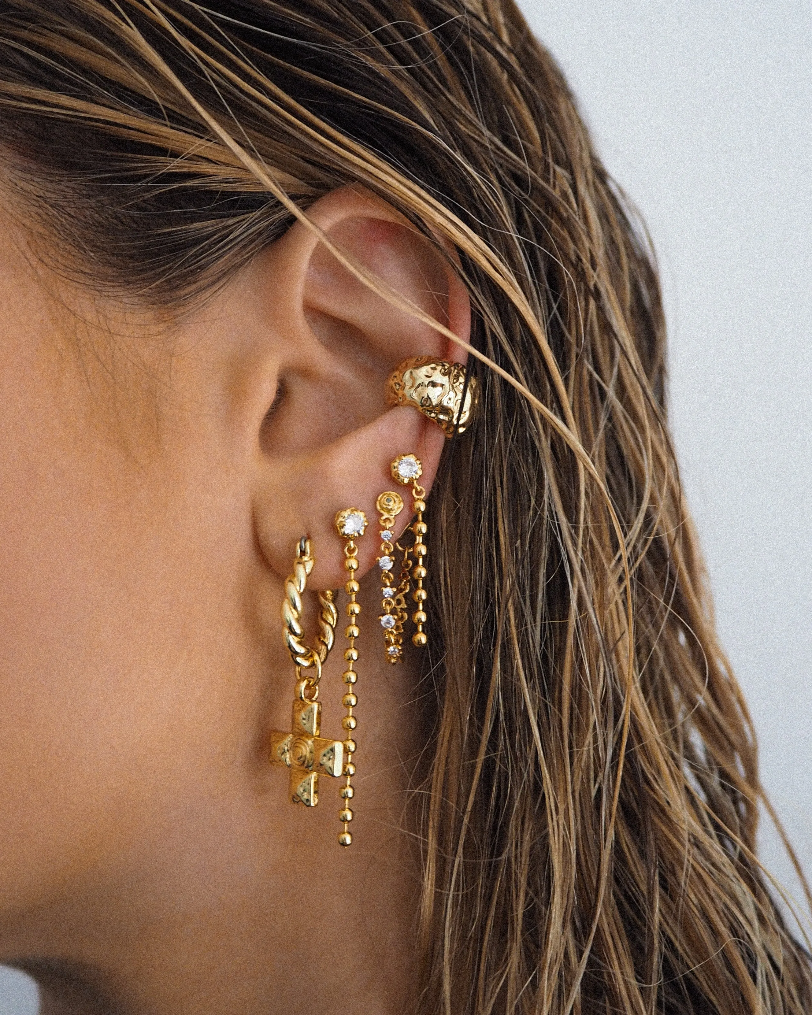 Molten Cross Twisted Hoops- Gold