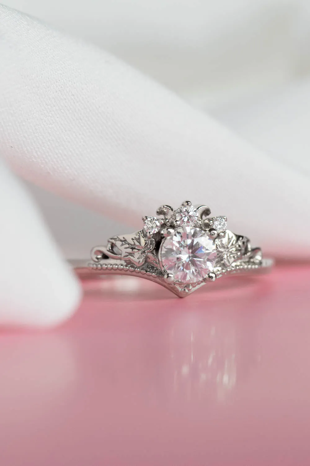 Round moissanite white gold engagement ring with tiny ivy leaves and diamonds / Ariadne