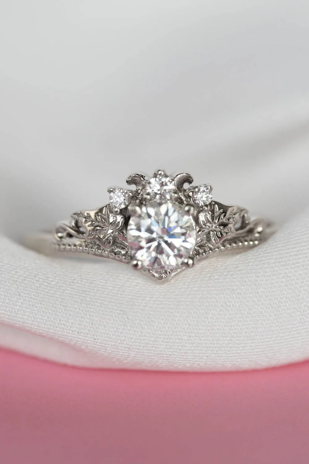 Round moissanite white gold engagement ring with tiny ivy leaves and diamonds / Ariadne
