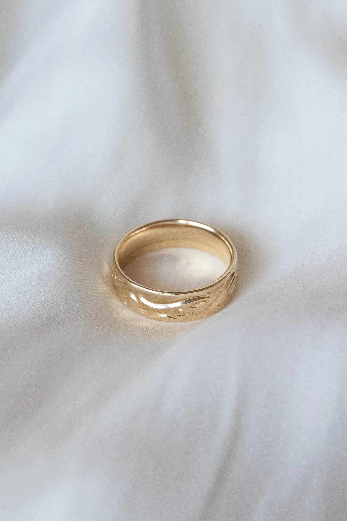 Wedding rings set for couples: gold band for him, infinity band with diamonds for her