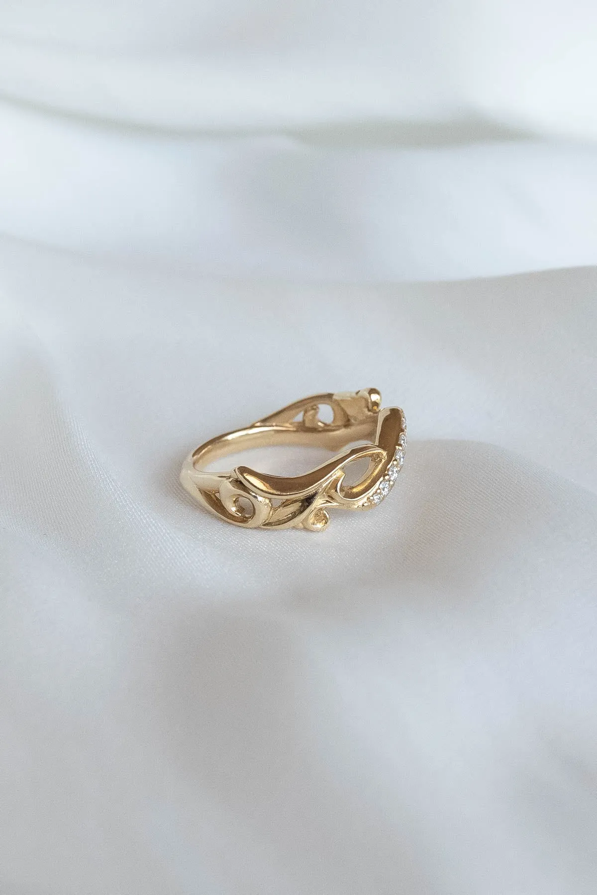 Wedding rings set for couples: gold band for him, infinity band with diamonds for her