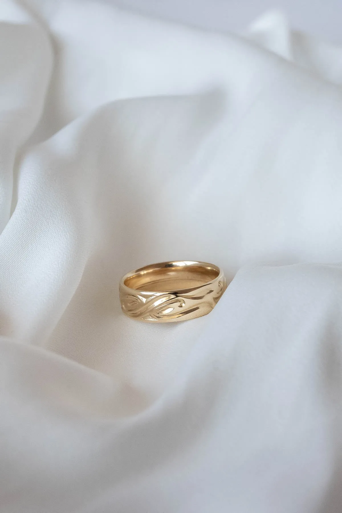 Wedding rings set for couples: gold band for him, infinity band with diamonds for her